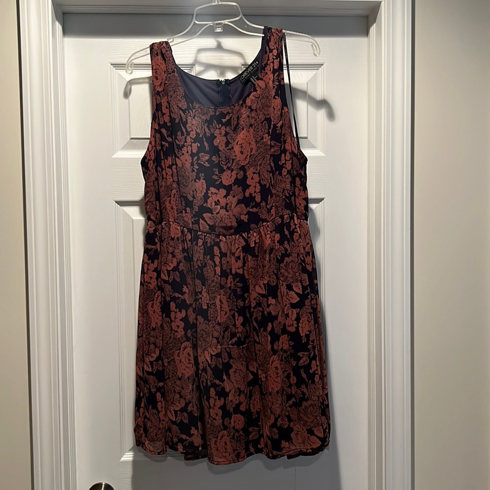 Navy blue floral baby doll dress. Knee length